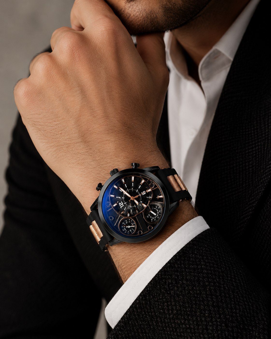 KRONOR ANIMA worn on the wrist with a dark suit